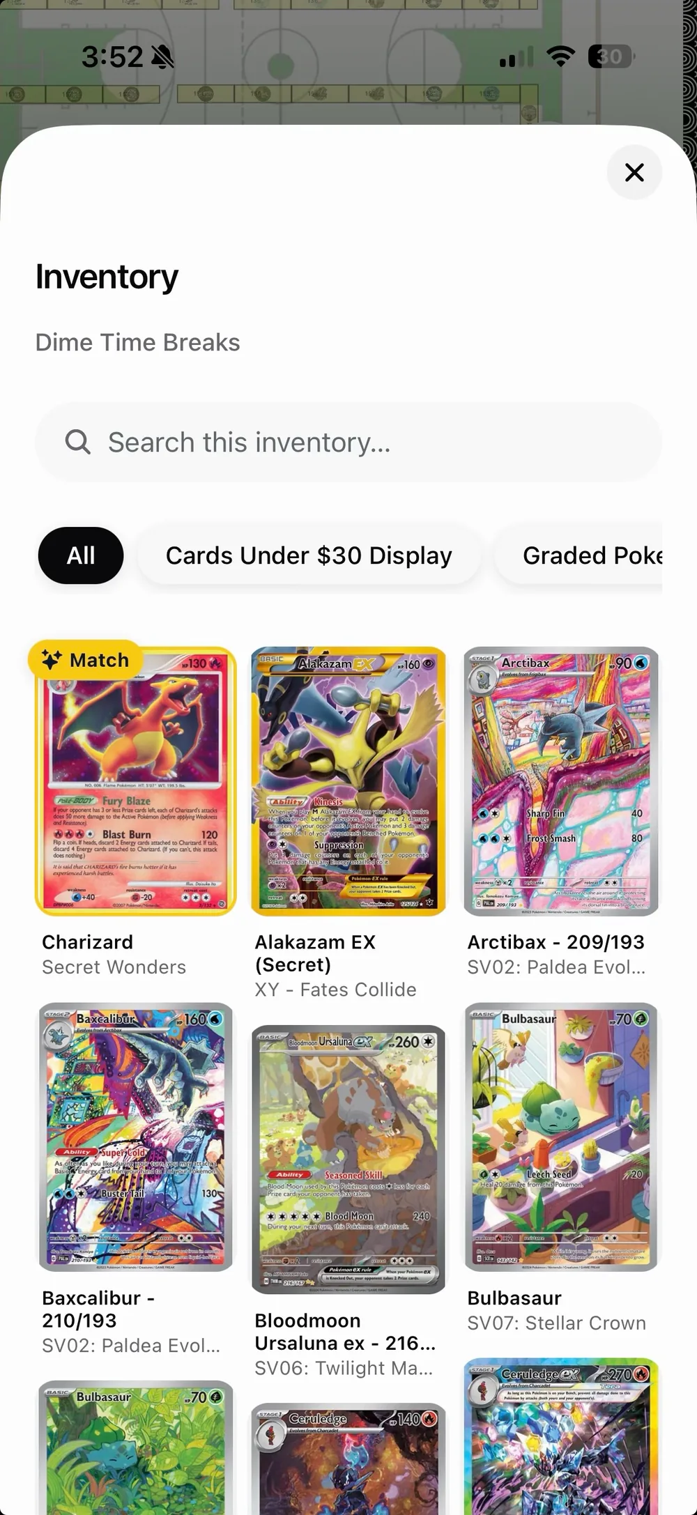 Vendor inventory with a Charizard card highlighted as a wishlist match
